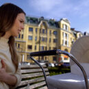 Woman looking into a pram