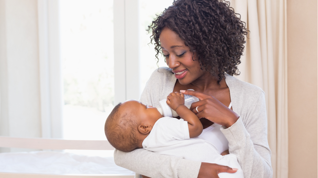 Mother and baby bottle feeding