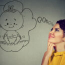 Mother with baby in thought bubble