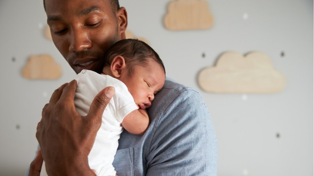 Father holding baby