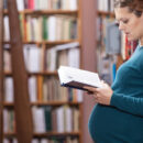 pregnancy concerns, pregnant woman reading
