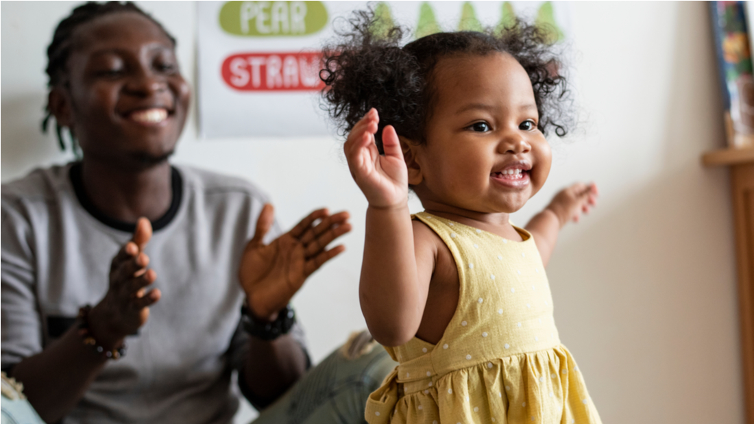 infant girl dancing