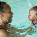 mother and baby, swimming with baby